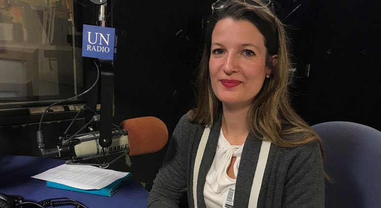 Researcher Rebecca Adami in the UN News radio studio at UN Headquarters in New York.