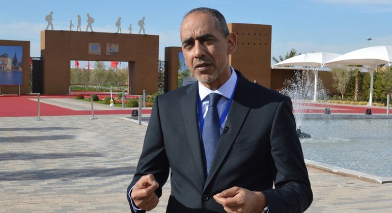 طارق يوسف، مدير مركز بروكنجز الدوحة، يتحدث إلى أخبار الأمم المتحدة في المؤتمر الحكومي الدولي حول الميثاق العالمي للهجرة المنعقد في مراكش، المغرب.