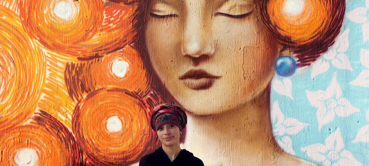 A group of young women graffiti artists painted orange murals in Guatemala City in support of UN Women and the UNiTE campaign to End Violence against Women, December 2018.