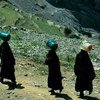 Women in Yemen travel hours each day for water. 