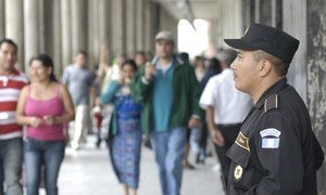 A National Civil Police agent patrols a trade district in zone 1, Guatemala City, Guatemala. (file)