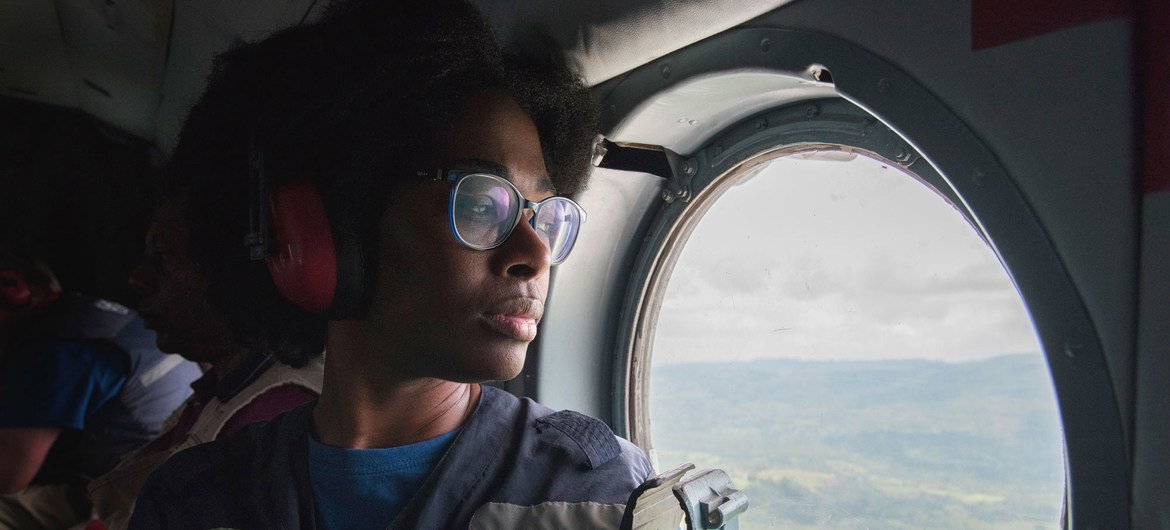 A member of the World Health Organization's (WHO) team tackling the Ebola outbreak in the Democratic Republic of the Congo travels by helicopter to Butembo in the east of the country in January 2019.