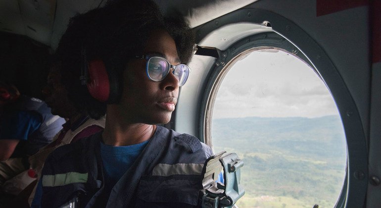 Marie-Roseline Darnycka Bélizaire, an epidemiologiist with the World Health Organisation team tackling the Ebola outbreak in the Democratic Republic of the Congo, travels by helicopter to Butembo in the east of the country in January 2019.