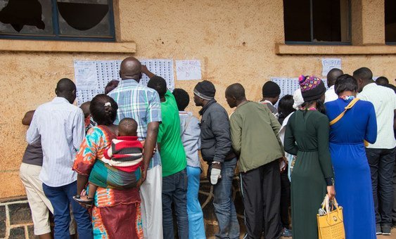 Voters look for their names in the lists during Presidential and Legislative elections in in the Democratic Republic of the Congo (30 December 2018).