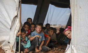 Children at a school tent in the northern Idlib, Syria. Humanitarian emergencies deprive children of health, nutrition, water and sanitation, education and other basic needs.