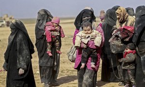 On 26 January 2019, in the Syrian Arab Republic, children and families are huddled together, after being forced to flee their homes, before embarking on the long and arduous journey to safety at Al-Hol camp.