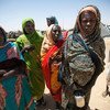 18 March 2014. Saraf Omra: A group of women in the new settlement for displaced people in the vicinity of the UNAMID base in Saraf Omra, North Darfur. 