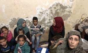 Om Ehab, right, with her sisters and children in her home in Beach Camp ifor Palestine Refugees in Gaza.