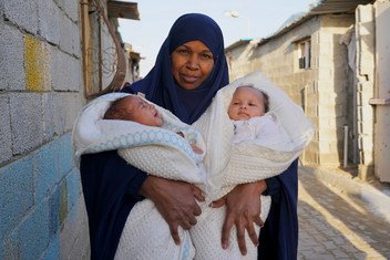 Haleema holds her two month old twins, in a camp for IDP's who fled the now destroyed Libyan town of Tawergha to the west of Benghazi.The Libyan Prime Minister and a key rival leader have pledged to hold a general election to help improve national stabili