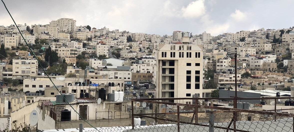Palestinian houses and Israeli settlements in H2 area in Hebron, West Bank. Palestinian houses and Israeli settlements in H2 area in Hebron, West Bank.