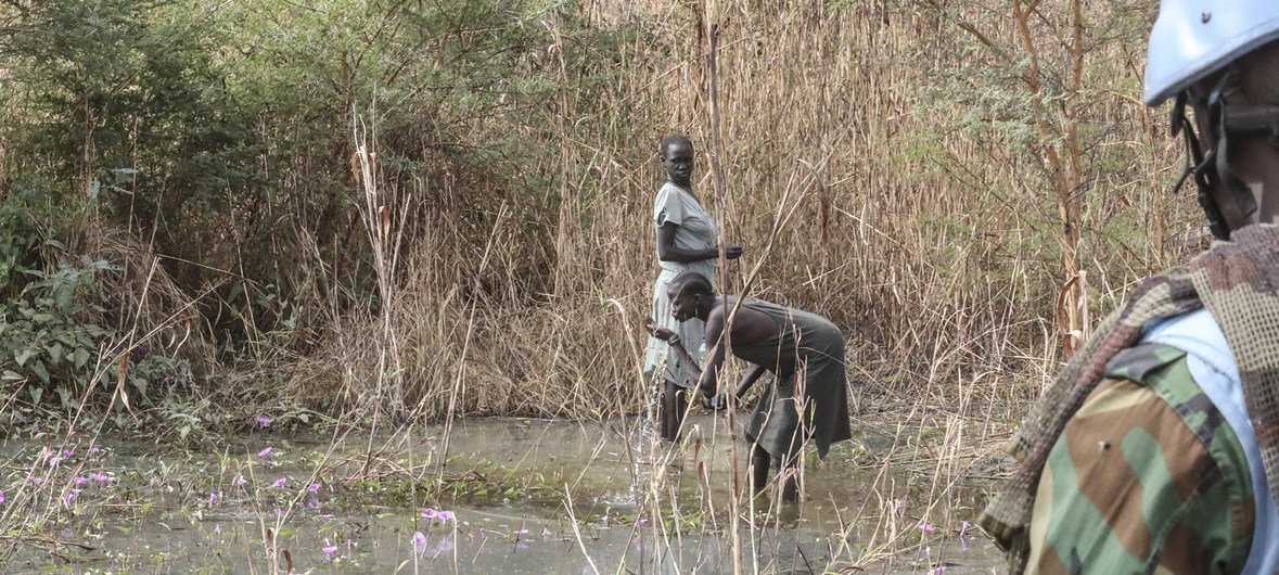 Peacekeepers serving with the United Nations Mission in South Sudan (UNMISS) conduct a firewood patrol for women from the Mission’s Protection of Civilians’ site (POC) in Bentiu. Such patrols are organized regularly to give protection to civilians as they