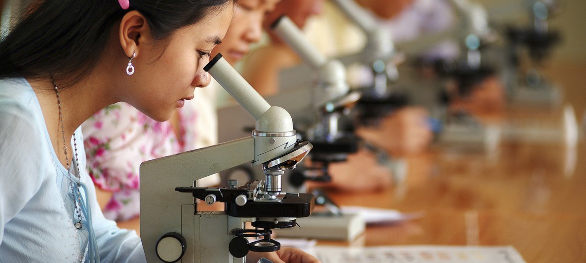 Girls studying science in Viet Nam. 