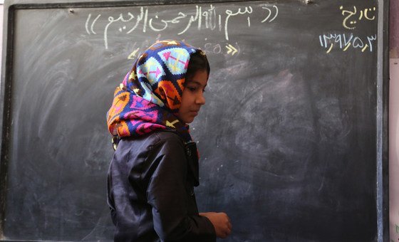 Afghanistan’s education system has been devastated by more than three decades of sustained conflict. For many of the country’s children, completing primary school remains a distant dream. Here, 10-year-old Fatima is on the board to solve a math question, 