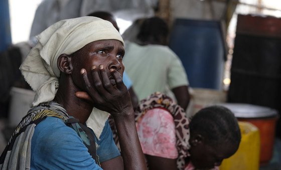 Portrait of a woman resident of Wau Shilluk, South Sudan. The town has been reduced to dust, as ongoing conflict has seen the complete destruction of homes, the school and hospital.