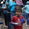 A agência destaca que as crianças e famílias deslocadas enfrentam desafios para regularizar o seu status imigratório