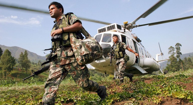 The service of Nepalese men and women has not come without enormous sacrifice – 76 of them have lost their lives serving under the UN flag over the past six decades. Nepalese peacekeepers serving with the UN Operation in Burundi are seen here arriving in the town of Isale to check on security and the local population in December 2004. 