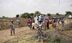 UNAMID peacekeepers from the Nepalese police contingent during a June 2018 patrol in Masteri, West Darfur. As part of its protection-of-civilians mandate, the Joint UN-AU Mission conducts daily patrols in various villages and camps housing internally disp