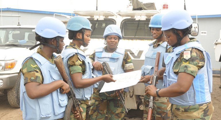 Female peacekeepers with the Ghanaian battalion serving with the UN peacekeeping mission in the Democratic Republic of the Congo (MONUSCO) prepare to go on a patrol in the capital, Kinshasa, in December 2015.