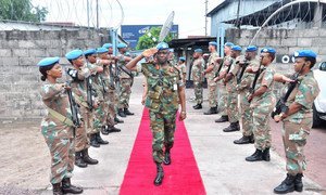 Brigadier General Emmanuel Wekem Kotia, the Commander of the Western Sector in the UN Peacekeeping Mission in the Democratic Republic of the Congo (MONUSCO), surveying troops.