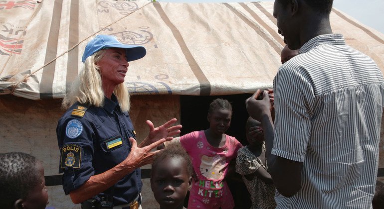In South Sudan, Sweden has deployed a number of police officers who are part of the UN mission, UNMISS. Here, a Swedish officer interacts with an internally displaced person in a protection of civilians site in the capital, Juba.