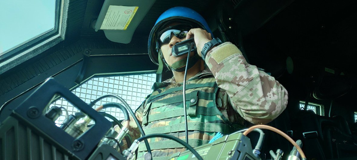 A UNIFIL radio operator from Malaysia communicates from his armoured personnel carrier while on duty in Marakah, south-west Lebanon. (file)