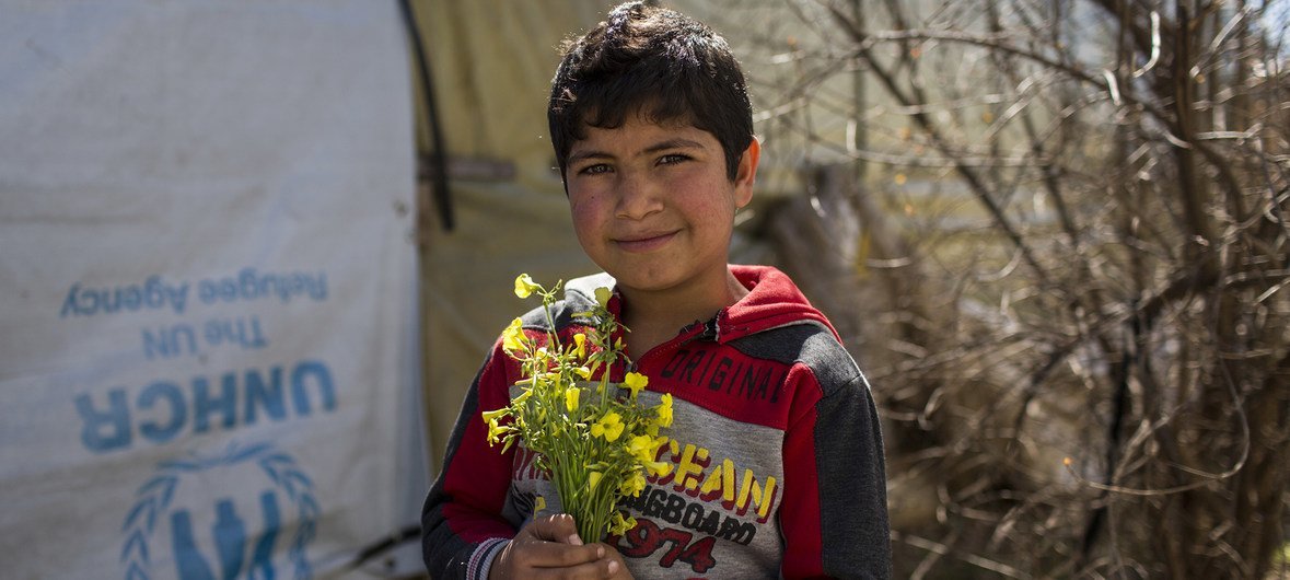 A Syrian refugee boy in Lebanon, who is the same age as the war that has engulfed his country for the past eight years.