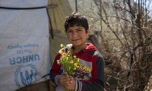 A Syrian refugee boy in Lebanon, who is the same age as the war that has engulfed his country for the past eight years.