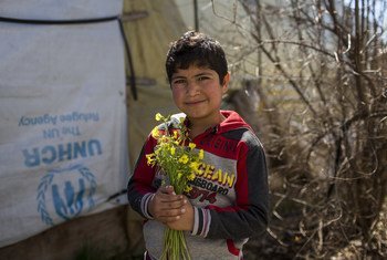 Un garçon réfugié syrien au Liban qui a huit ans, soit le même nombre d'années que la guerre qui sévit dans son pays depuis 2011.