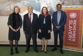 Secretary-General António Guterres (centre left) and María Fernanda Espinosa Garcés, President of the seventy-third session of the General Assembly (centre right), pose for a photo with Alison Smale (left), Under-Secretary-General for Global Communications, and Christopher Cozier, artist and keynote speaker from Trinidad and Tobago, ahead of the commemorative meeting of the General Assembly to mark the International Day of Remembrance of the Victims of Slavery and the Transatlantic Slave Trade.