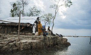 A family left homeless by cyclone Aila wait for assistance in Koira, Khulna District, Bangladesh.