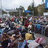 In a situation of human mobility, hundreds of Venezuelans wait in line at the Rumichaca border of Ecuador with Colombia to seal their passport and continue their journeys.
