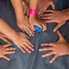 2018年11月，在墨西哥城的一个体育馆中的临时避难所里，一些孩子正在联合国儿童基金会支持的儿童友好空间里玩耍。