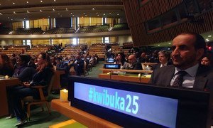 At a somber commemoration of the International Day of Reflection on the 1994 Genocide against the Tutsi in Rwanda in the General Assembly Hall, the social media hashtag #kwibuka25 means 'to remember', April 2019.