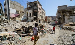 Children walk through a damaged part of downtown Craiter in Aden, Yemen. The area was badly damaged by airstrikes in 2015 as the Houthi’s were driven out of the city by coalition forces.