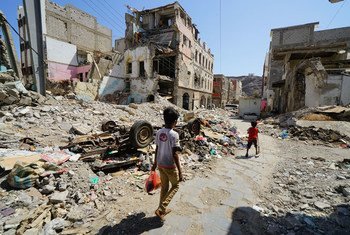 Children walk through a damaged part of downtown Craiter in Aden, Yemen. The area was badly damaged by airstrikes in 2015 as the Houthi’s were driven out of the city by coalition forces.