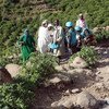 بعثة يوناميد والفريق القطري يقدمون المساعدة إلى ضحايا الإنزلاق الأرض في شرق جبل مرة بجنوب دارفور، سبتمبر 2018.