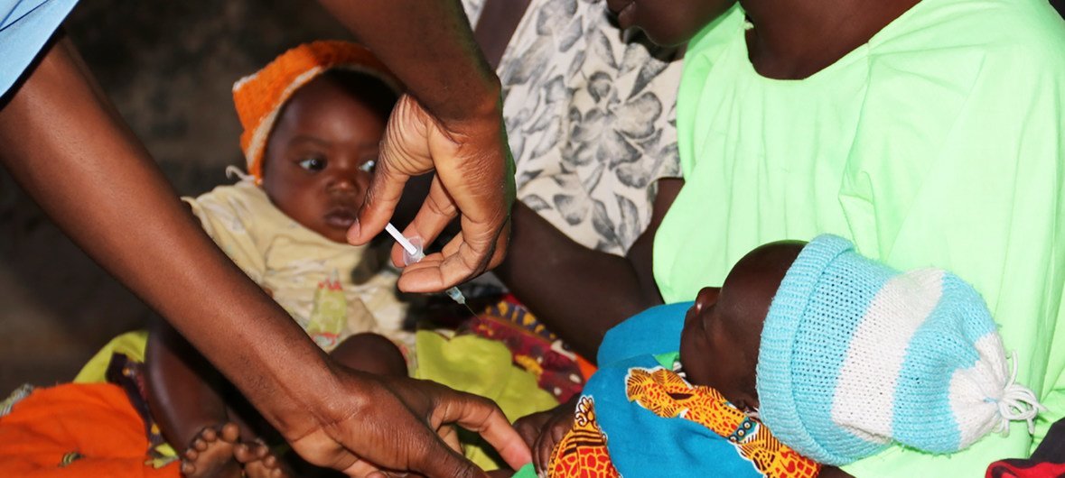 The malaria vaccine is administered to a five-month old child at Mkaka in Malawi. (April 2019)