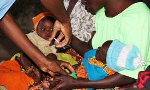 The malaria vaccine is administered to a five-month old child at Mkaka in Malawi. (April 2019)