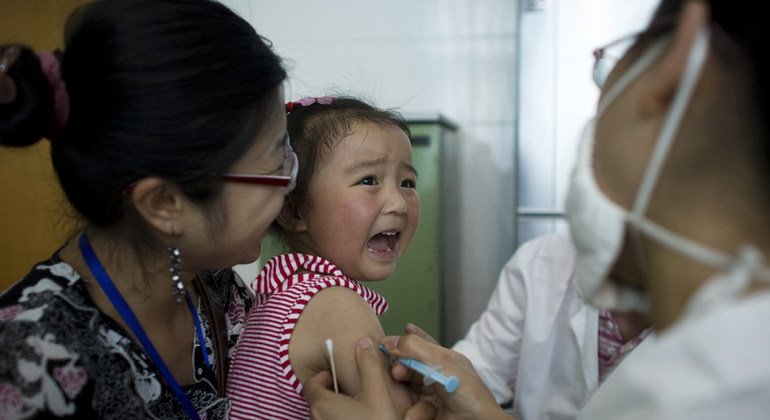 A girl cries while being vaccinated against Hepatitis A, in Chengdu, capital of the southwest Sichuan Province.