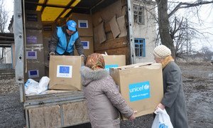 UNICEF distributes aid supplies to women in the village of Petrivske, Donetsk region, Ukraine. (February 2015)