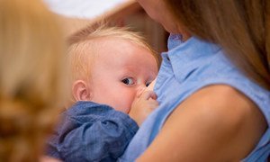 A mother from Luhansk feeding her baby while taking part in the workshop “Breastfeeding and infant feeding of children in emergencies” organized by UNICEF in Kyiv, Ukraine, in 2015.