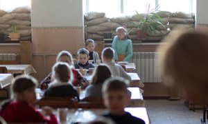 In Mariinka, eastern Ukraine, evacuation drills and learning how to take cover in the school’s underground bomb shelter have become part of students’ education. 