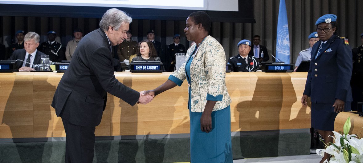 Secretary-General António Guterres bestows Mbaye Diagne Medal to Lachel Chitete Mwenechanya, widow of Private Chancy Chitete, a former UN peacekeeper from Malawi who posthumously received a medal for exceptional courage in the service of peace. (24 May 20