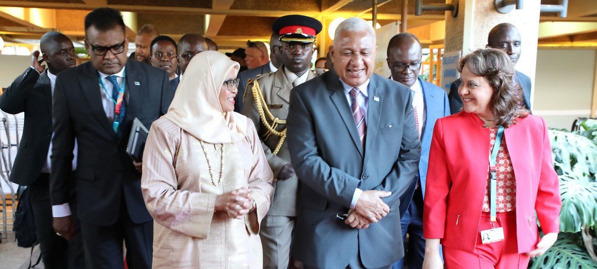Prime Minister Josai Vorege Bainimarama (centre) of Fiji is greeted by UN-Habitat's Executive Director Maimunah Mohd Sharif (left) and Assembly President Martha Delgado on arrival for the Assembly Strategic Dialogue in Nairobi.