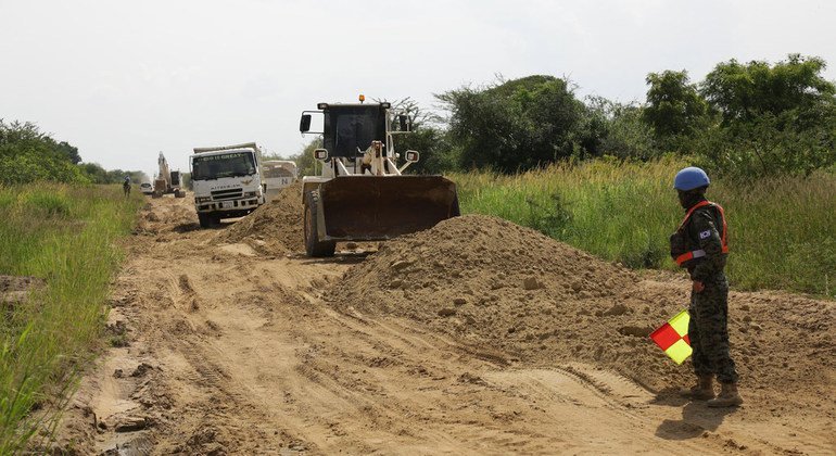 South Korean engineers use heavy equipment vehicles to grade the roads as part of the rehabilitation of transport infrastructure in South Sudan.