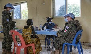 A local woman seeks advice at a medical camp run by South Korean peacekeepers in South Sudan.