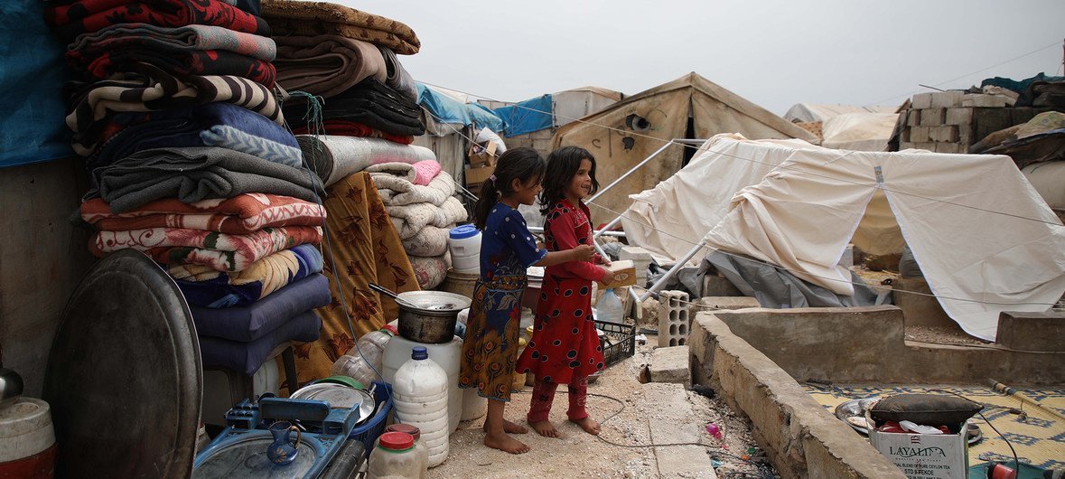 Children fleeing the escalating violence in Idlib take shelter in an overcrowded IDP camp in the Atmeh village, close to the Turkish border in the Syrian Arab Republic. (May 2019)