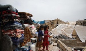 Children fleeing the escalating violence in Idlib take shelter in an overcrowded IDP camp in the Atmeh village, close to the Turkish border in the Syrian Arab Republic. (May 2019)