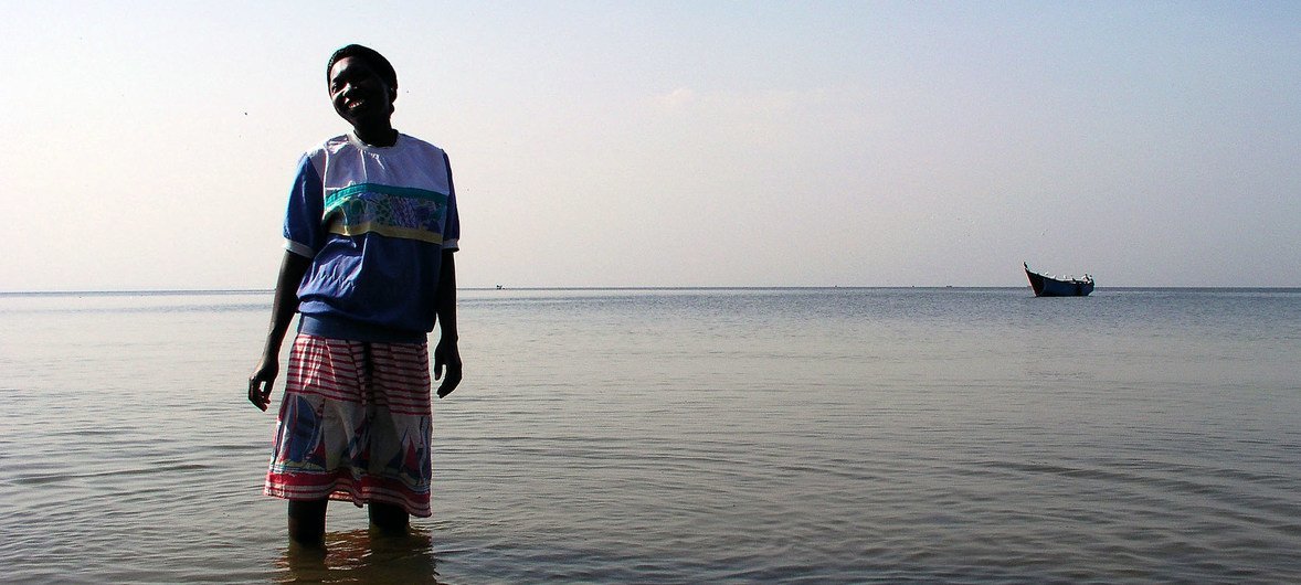 Oceans and seas are home to vast biodiversity.  A woman in Entebbe, is photographed on the shores of Lake Victoria, Uganda. 