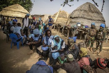 UN human rights investigators accompanied by peacekeepers from the UN mission in Mali, MINUSMA, meet villagers in central Mali after their homes were attacked in February 2019.